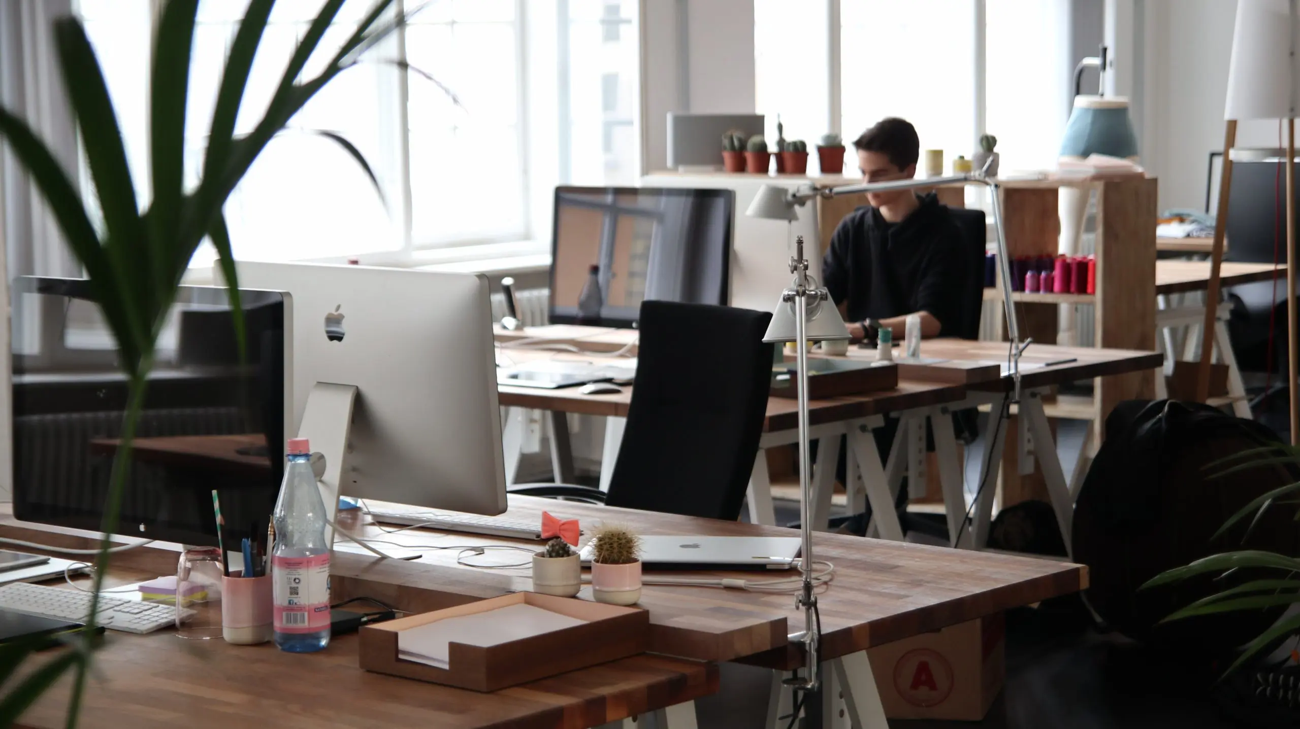 A man sits in the office